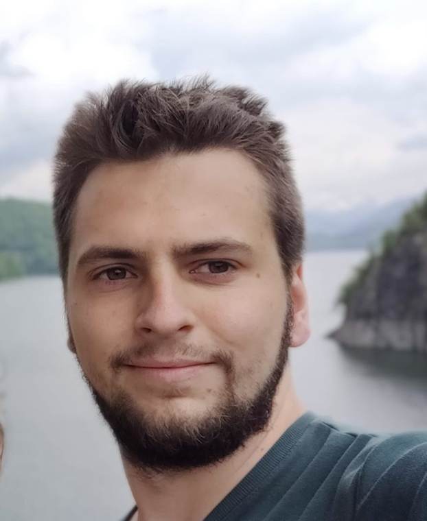 Martin Malobický, portrait by a mountain lake